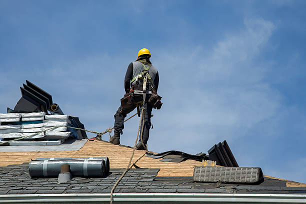 Professional Roofing technician working in Dow City, IA